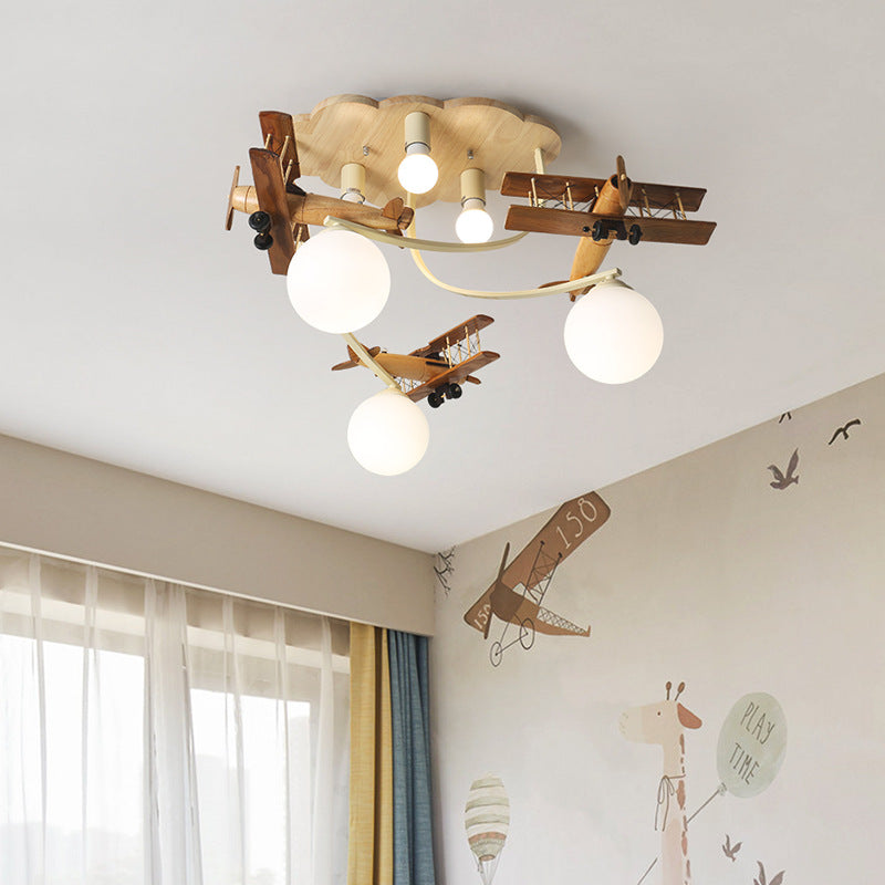 Contemporary Nordic Kids Iron Rubber Wood Glass Plane Cloud Ball 6-Light Flush Mount Ceiling Light For Bedroom Cuvalon
