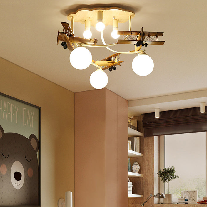 Contemporary Nordic Kids Iron Rubber Wood Glass Plane Cloud Ball 6-Light Flush Mount Ceiling Light For Bedroom Cuvalon