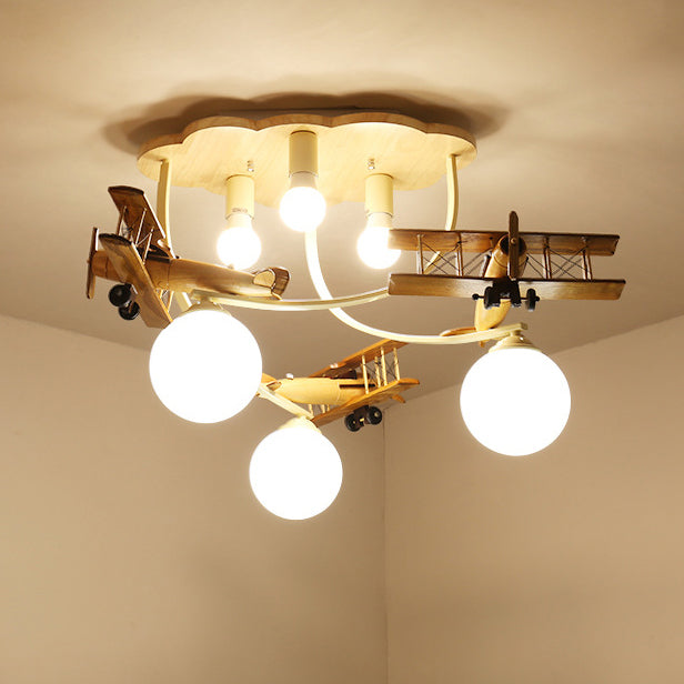 Contemporary Nordic Kids Iron Rubber Wood Glass Plane Cloud Ball 6-Light Flush Mount Ceiling Light For Bedroom Cuvalon