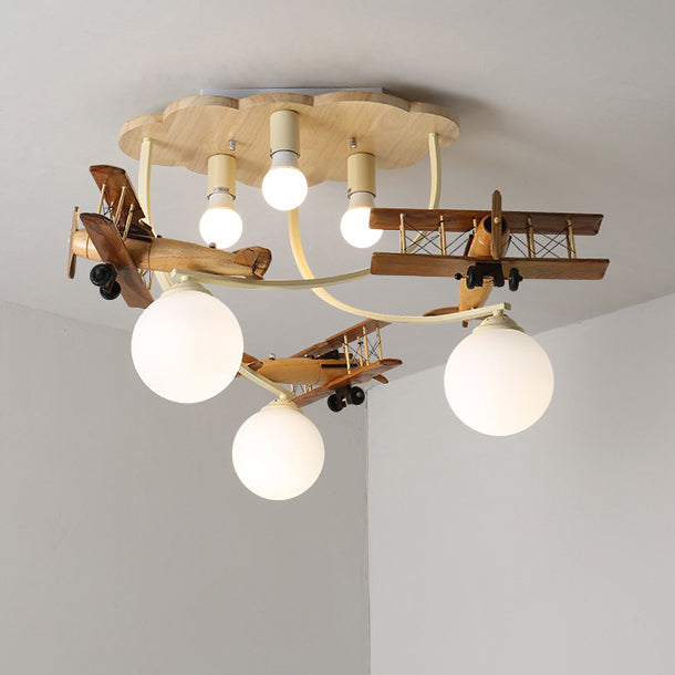 Contemporary Nordic Kids Iron Rubber Wood Glass Plane Cloud Ball 6-Light Flush Mount Ceiling Light For Bedroom Cuvalon