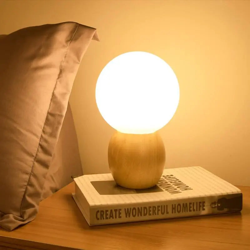 Nordic Solid Wood Milk White Glass Orb 1-Light Table Lamp Cuvalon