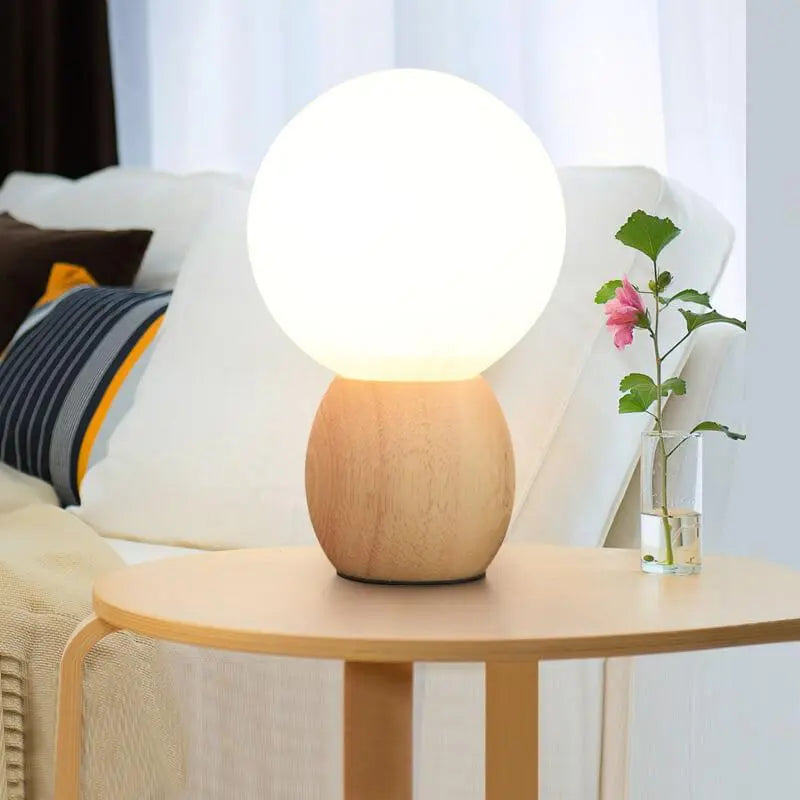 Nordic Solid Wood Milk White Glass Orb 1-Light Table Lamp Cuvalon