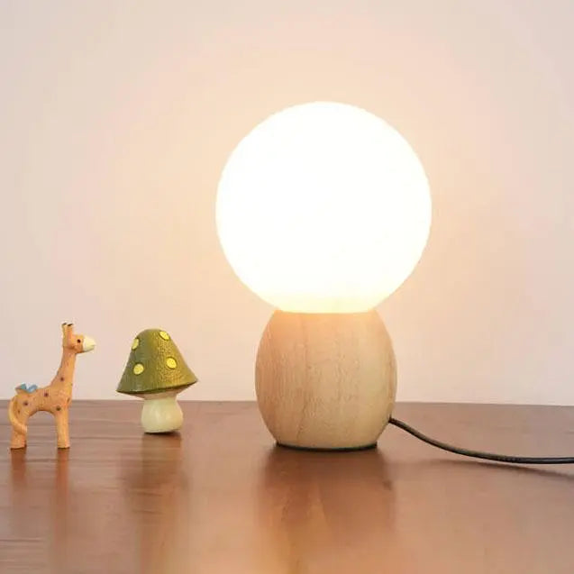 Nordic Solid Wood Milk White Glass Orb 1-Light Table Lamp Cuvalon
