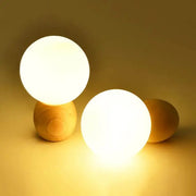 Nordic Solid Wood Milk White Glass Orb 1-Light Table Lamp Cuvalon