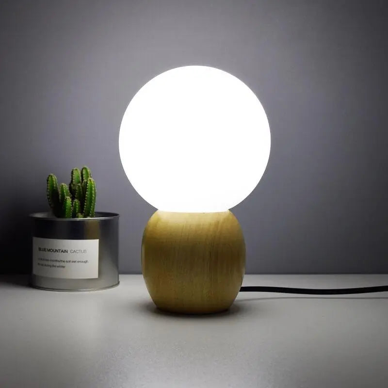 Nordic Solid Wood Milk White Glass Orb 1-Light Table Lamp Cuvalon