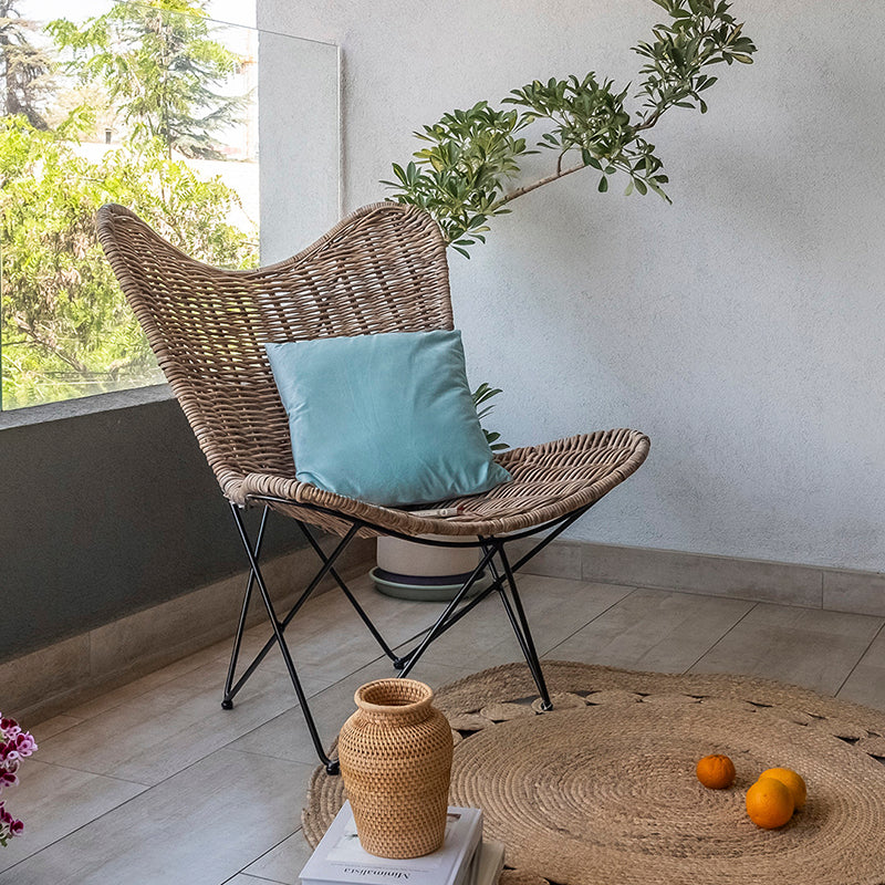 Contemporary Scandinavian Handwoven Rattan Lounge Chair - Accent Chair With Ergonomic Backrest & Iron Base For Boutique Indoor & Outdoor Spaces Cuvalon