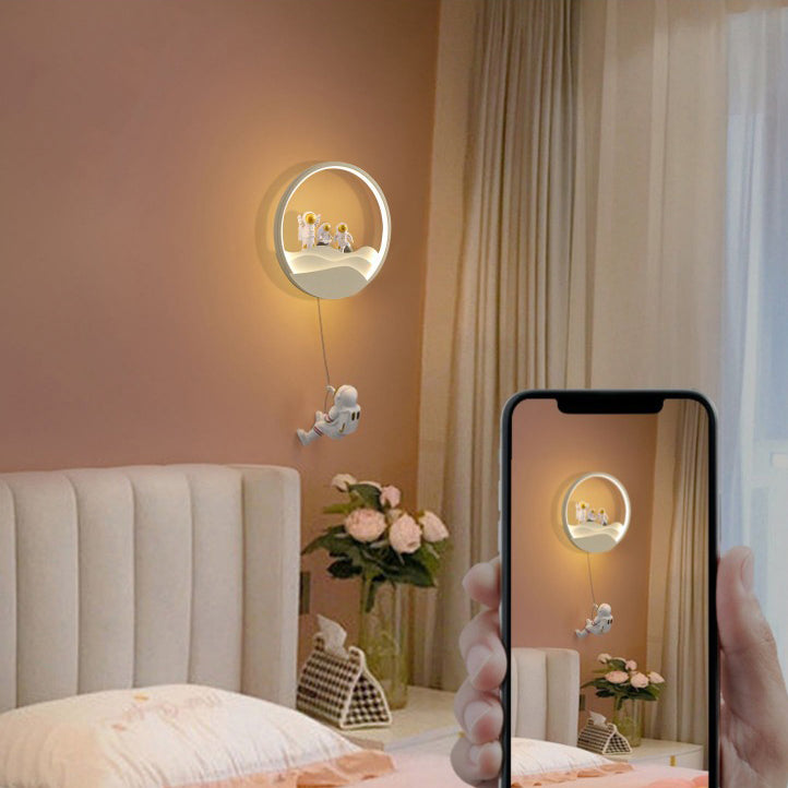 Contemporary Creative Kids Astronaut Rotating Lunar Eclipse Silicone Resin Aluminum LED Wall Sconce Lamp For Bedroom Cuvalon
