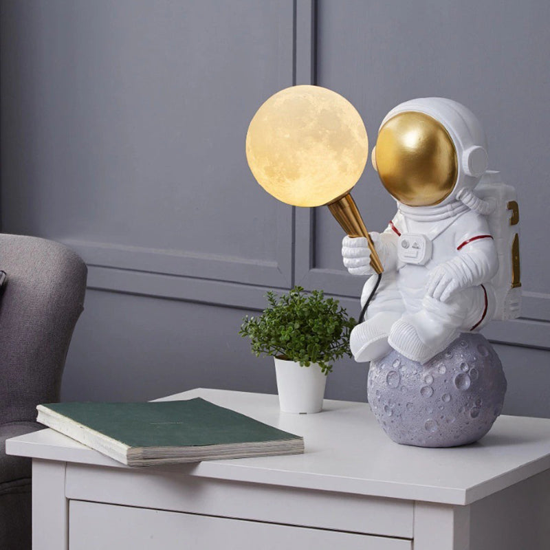 Creative Kids Table Lamp – 1-Light Cartoon Astronaut Resin Lamp for Bedroom Cuvalon