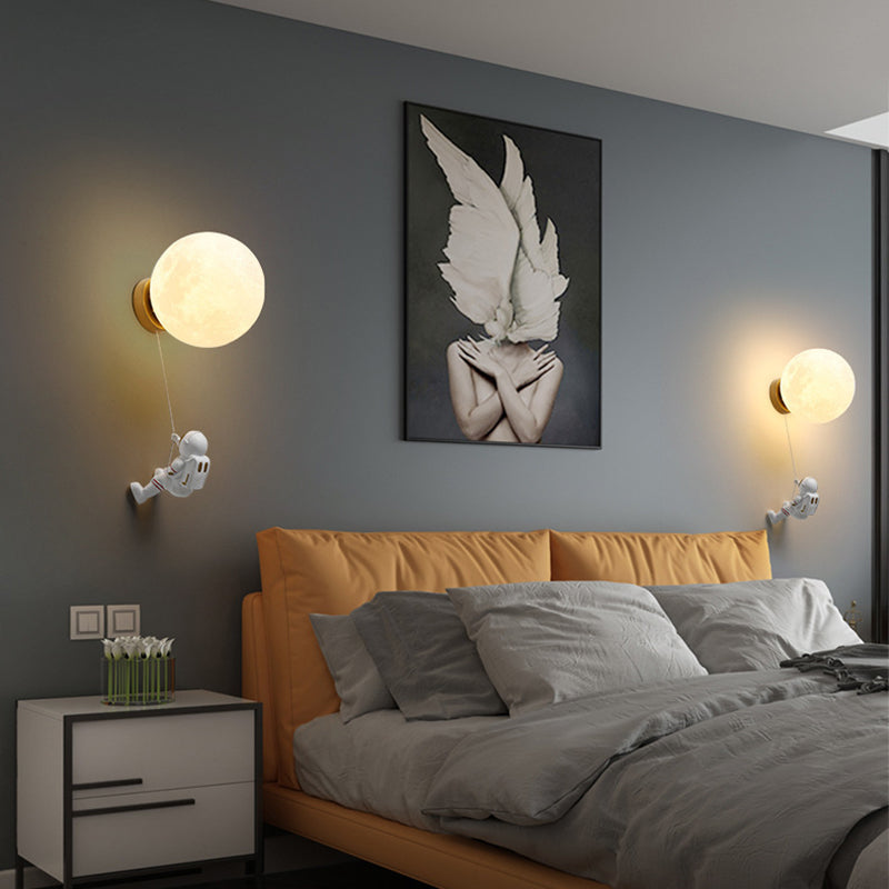Contemporary Nordic Kids Resin Glass Ball Astronaut Lunar Planet 1-Light Wall Sconce Lamp For Bedside Cuvalon