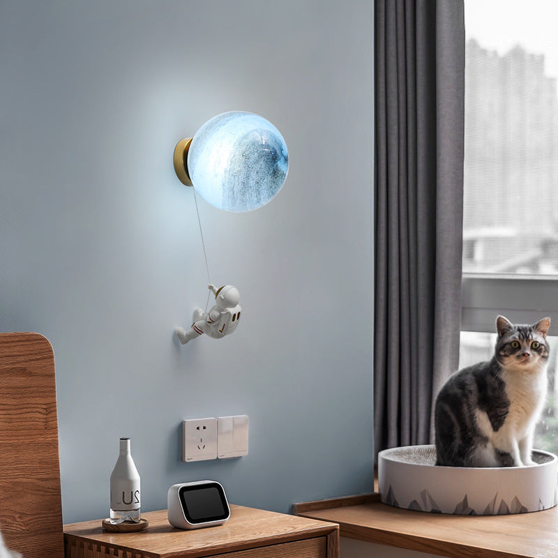Contemporary Nordic Kids Resin Glass Ball Astronaut Lunar Planet 1-Light Wall Sconce Lamp For Bedside Cuvalon