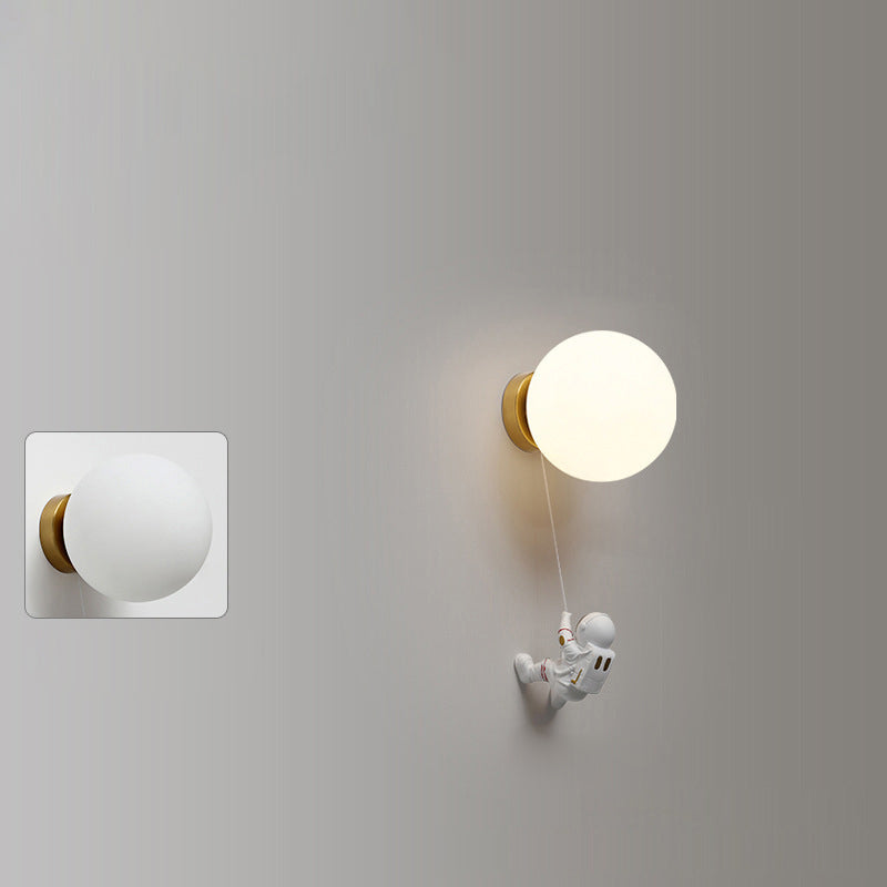 Contemporary Nordic Kids Resin Glass Ball Astronaut Lunar Planet 1-Light Wall Sconce Lamp For Bedside Cuvalon