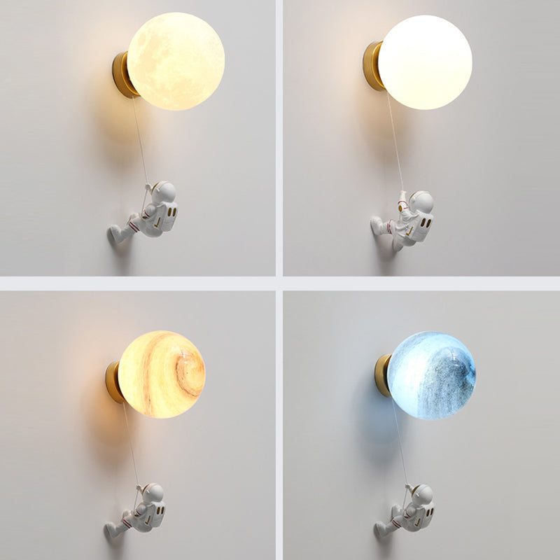 Contemporary Nordic Kids Resin Glass Ball Astronaut Lunar Planet 1-Light Wall Sconce Lamp For Bedside Cuvalon